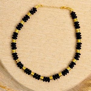 New two tone gold and black beaded necklace